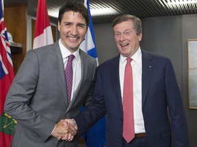 Prime Minister Justin Trudeau meets with Toronto Mayor John Tory at City Hall before meeting with organizers and volunteers of the Peeks Toronto Caribbean Carnival in Toronto, Ont. on Friday July 6, 2018.