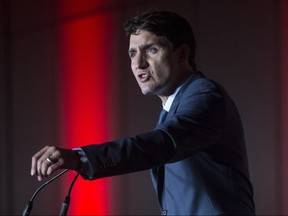 Prime Minister Justin Trudeau delivers remarks at a Liberal Party fundraising event in Brampton, Ontario on Thursday July 5, 2018. (The Canadian Press/Chris Young)