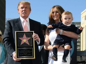 Donald Trump, seen here with his wife Melania and their son Barron, was honoured with the 2,327th star on the Hollywood Walk of Fame on in Hollywood, Calif., on Jan. 16, 2007.