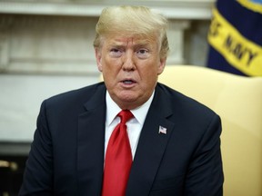 President Donald Trump speaks during a meeting with European Commission president Jean-Claude Juncker in the Oval Office of the White House, Wednesday, July 25, 2018, in Washington.