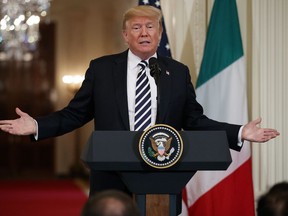 President Donald Trump speaks during a news conference with Italian Prime Minister Giuseppe Conte in the East Room of the White House, Monday, July 30, 2018, in Washington. (AP Photo/Evan Vucci)