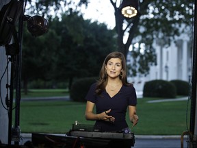 CNN White House correspondent Kaitlan Collins talks during a live shot in front of the White House, Wednesday, July 25, 2018, in Washington. (AP Photo/Alex Brandon)