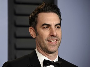 Sacha Baron Cohen arrives at the Vanity Fair Oscar Party in Beverly Hills, Calif. on March 4, 2018. (Evan Agostini/Invision/AP)