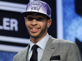 In this June 23, 2011, file photo, UCLA's Tyler Honeycutt is seen after being selected by the Sacramento Kings in the NBA draft in Newark, N.J. (AP Photo/Bill Kostroun, File)