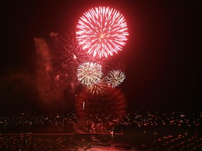 Fireworks are seen from the roof of the Hilton Hotel on July 3, 2017, bursting above Lake Michigan along the shores of downtown Chicago, Illinois. (Jeff Haynes/Getty Images)