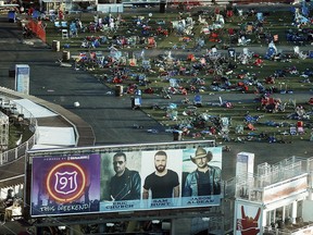 In this Oct. 3, 2017 file photo, personal belongings and debris litters the Route 91 Harvest festival grounds across the street from the Mandalay Bay resort and casino in Las Vegas. (AP Photo/Marcio Jose Sanchez, File)