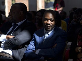 Zimbabwean opposition challenger Nelson Chamisa participates in a Sunday church service in Harare, Zimbabwe, Sunday July 29, 2018. (AP Photo/Jerome Delay)