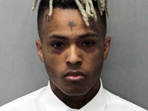 This photo released by the Miami-Dade Corrections & Rehabilitation Department shows rapper XXXTentacion.