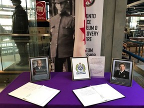 A book of condolences for the families of two officers killed in Fredericton last week is shown at police headquarters in Toronto in this handout photo. (The Canadian Press/HO - Toronto Police)