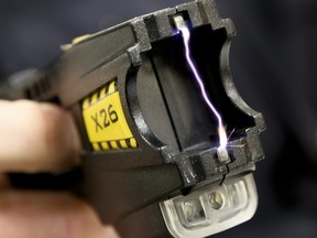 A close up of 50,000 volts arcing between the two terminals of a Taser X26 conductive energy weapon during a conducted energy weapon training session at the Owen Sound police station on Thursday May 14, 2015.