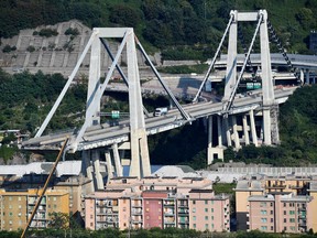 A view of the partially collapsed Morandi highway bridge, in Genoa, Italy, Sunday, Aug. 19, 2018. (Luca Zennaro/ANSA via AP)