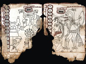 This undated photo released by Mexico's National Anthropology and History Institute (INAH) shows an ancient Maya pictographic text that has been judged authentic by scholars in Mexico City. (INAH via AP)