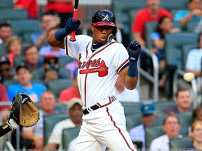 Ronald Acuna Jr. of the Atlanta Braves is hit by the first pitch of the game against the Miami Marlins at SunTrust Park on August 15, 2018 in Atlanta. (Daniel Shirey/Getty Images)
