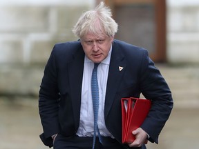 Britain's then Foreign Secretary Boris Johnson arrives in Downing Street in London on March 7, 2018. (Daniel Leal-Olivas/Getty Images)