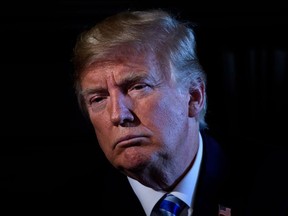 US President Donald Trump chairs a meeting with administration and state officials on prison reform at the Trump National Golf Club August 9, 2018 in Bedminster, New Jersey.