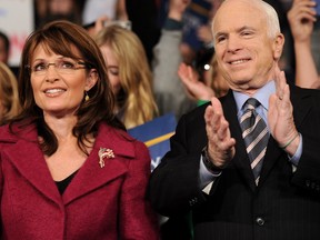 In this file photo taken on October 28, 2008 Republican presidential candidate Arizona Senator John McCain and his vice presidential candidate Sarah Palin attend a campaign rally at Giant Center in Hershey, Pennsylvania. (ROBYN BECK/AFP/Getty Images)