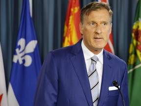 Quebec MP Maxime Bernier speaks at a press conference in Ottawa on Thursday, Aug. 23, 2018. THE CANADIAN PRESS/Adrian Wyld