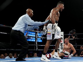 Eleider Alvarez celebrates after he knocked down Sergey Kovalev for the first time during the WBO/IBA Light Heavyweight Title bout at the Hard Rock Hotel & Casino Atlantic City on Aug.  4, 2018 in Atlantic City, N.J.