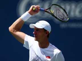 South African Kevin Anderson returns a shot against Grigor Dimitrov of Bulgaria on Friday. GETTY IMAGES