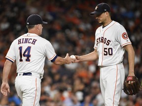 Houston Astros starting pitcher Charlie Morton (50) is removed from the game by manager A.J. Hinch during a game against the Oakland Athletics, Tuesday, Aug. 28, 2018, in Houston.