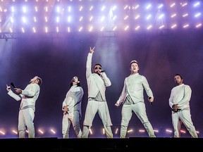 In this July 9, 2017, file photo, Brian Littrell, from left, Kevin Richardson, AJ McLean, Nick Carter and Howie Dorough of the Backstreet Boys perform during the Festival d'ete de Quebec in Quebec City. (Amy Harris/Invision/AP, File)