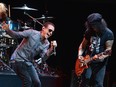 In this May 30, 2013, file photo, Chester Bennington and Slash perform during the Ninth Annual MusiCares MAP Fund Benefit Concert at Club Nokia in Los Angeles.
