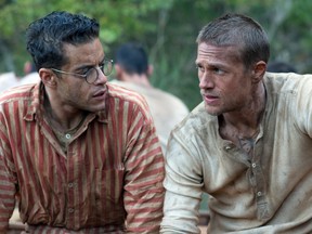 This image released by Bleecker Street shows Rami Malek, left, and Charlie Hunnam in a scene from "Papillon." (Jose Haro/Bleecker Street via AP)