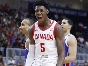 Canada's R. J. Barrett celebrates a basket against the Dominican Republic during their FIBA Basketball World Cup Qualifier game in Toronto, June 29, 2018.