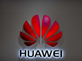 In this Wednesday, July 4, 2018, photo, the Huawei logo is seen at a Huawei store at a shopping mall in Beijing.