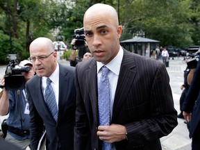In this Sept. 21, 2015, file photo, retired professional tennis player James Blake arrives at City Hall in New York.