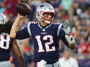 Tom Brady of the New England Patriots throws a pass against the Philadelphia Eagles at Gillette Stadium on August 16, 2018 in Foxborough, Massachusetts. (Tim Bradbury/Getty Images)