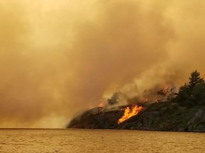 The wildfire known as Parry Sound 33 is seen in an OPP photo. (OPP_NER/Twitter)