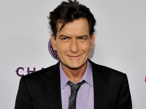 In this April 11, 2013 file photo, Charlie Sheen poses at the Cinerama Dome in Los Angeles. (Chris Pizzello/Invision/AP, file)