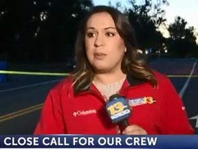 Reporter Krystal Story was reporting live from a shooting when she was nearly run down. (Video screengrab)