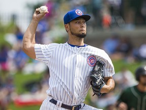 Chicago Cubs' Yu Darvish pitches for the South Bend Cubs Sunday, Aug. 19, 2018, at Four Winds Field in South Bend, Ind. (Robert Franklin/South Bend Tribune via AP)