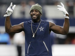 In this Nov. 5, 2017, file photo, Dallas Cowboys wide receiver Dez Bryant (88) warms up before a game against the Kansas City Chiefs, in Arlington, Tex. (AP Photo/Brandon Wade, File)