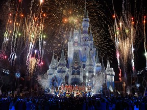 In this handout photo provided by Disney Parks, a view of fireworks, holiday lights and fanfare at Cinderella's Castle during a taping of Disney Parks Presents a Disney Channel Holiday Celebration at Walt Disn. 5, 2017 in Lake Buena Vista, Fla.