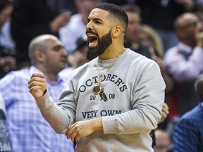 Drake cheers on the Toronto Raptors against the Washington Wizards at the Air Canada Centre in Toronto, Ont. on Tuesday, April 17, 2018. (Ernest Doroszuk/Toronto Sun)