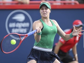 Eugenie Bouchard cruised past countrymate Carol Zhao to the second round of qualifying for the U.S. Open on Tuesday.