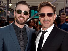 Chris Evans (L) and Robert Downey Jr. attend the premiere of Marvel's "Captain America: Civil War" at Dolby Theatre on April 12, 2016 in Los Angeles, Calif.