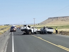This Monday, Aug. 13, 2018 photo provided by the Oregon State Police shows the scene of a fatal car crash outside Burns, Ore. (Oregon State Police via AP)