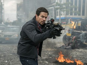 This cover image released by STXfilms shows Mark Wahlberg in a scene from "Mile 22."