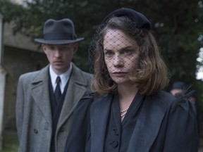 This image released by Focus Features shows Domhnall Gleeson, left, and Ruth Wilson in a scene from "The Little Stranger."