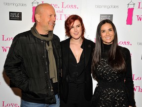 Actor Bruce Willis, Actresses Rumer Willis and Demi Moore attend the "Love, Loss & What I Wore" new cast member celebration at B Smith's Restaurant on March 24, 2011 in New York City.