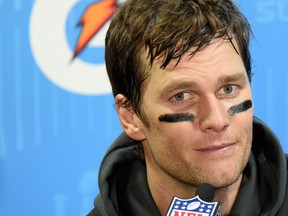 Tom Brady of the New England Patriots speaks to the media after losing 41-33 to the Philadelphia Eagles in Super Bowl LII at U.S. Bank Stadium on February 4, 2018 in Minneapolis, Minnesota.  (Larry Busacca/Getty Images)