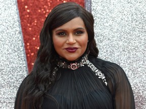 U.S. actor Mindy Kaling poses on the carpet upon arrival to attend he European premiere of the film " Ocean's 8" in London on June 13, 2018.