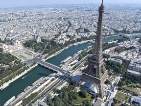 An aerial view shows the Eiffel tower by the river Seine during the annual Bastille Day military parade on the Champs-Elysees avenue in Paris on July 14, 2018. (Gerard Julien/Getty Images)