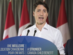 Prime Minister Justin Trudeau answers reporters questions during an event in Saint-Eustache, Que., Thursday, August 16, 2018.