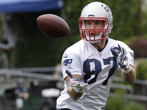 In this June 7, 2018, file photo, New England Patriots tight end Rob Gronkowski catches the ball during a minicamp practice, in Foxborough, Mass. (AP Photo/Steven Senne, File)