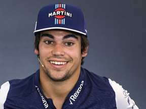 Williams driver Lance Stroll of Canada takes part in a media conference ahead of the Belgian Grand Prix in Spa-Francorchamps, Belgium, Thursday, Aug. 23, 2018.